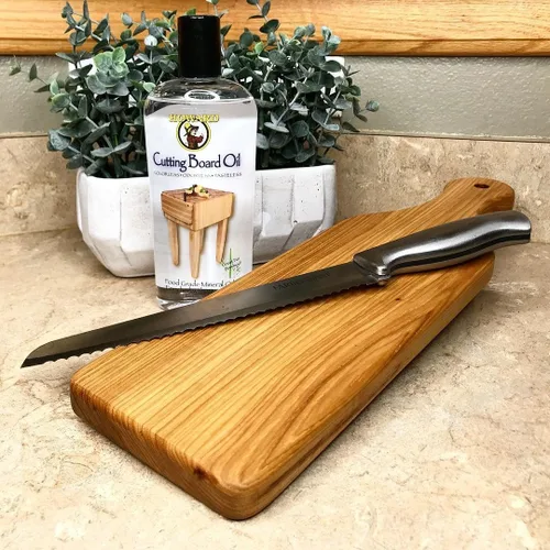 Vista 5 de Aceite mineral de grado alimenticio Howard Products para tabla de cortar de madera - 12 oz, paquete de 1