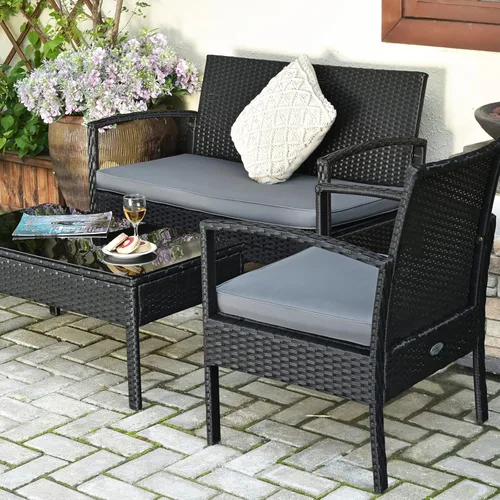 Vista 5 de COSTWAY Juego de 4 muebles de ratán para patio, juego de conversación de mimbre al aire libre con mesa de café de vidrio templado, cojines