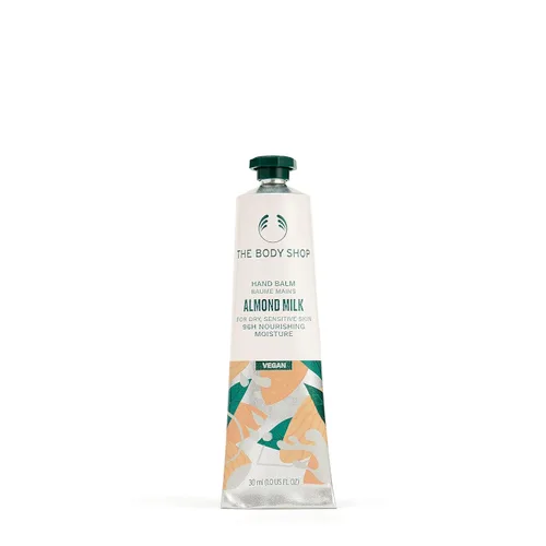 Vista 9 de The Body Shop Crema de manos de karité – Fragancia de nuez, hidratación y protección para llevar – 1.0 oz