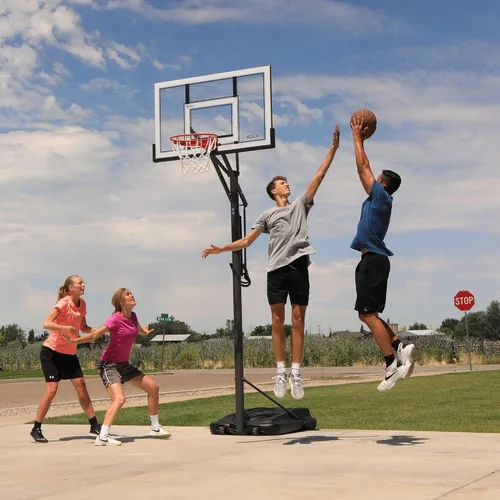 Vista 9 de Lifetime Aro de baloncesto ajustable portátil, tablero de acrílico con marco de acero de 54 pulgadas, ajuste de altura de elevación de potencia