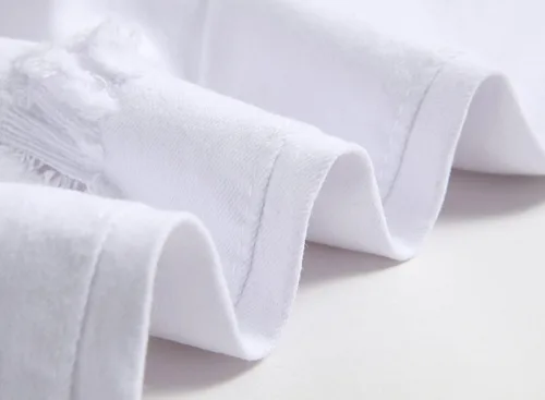 Vista 6 de Jeans ajustados para niño, elásticos, de aspecto desgastado y desgarrado